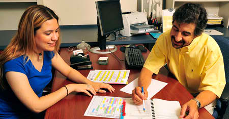 Student Receiving Help From Advisor