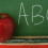 Apple in Front of Chalkboard