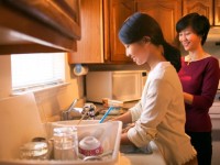 Female College Student at Home With Her Mother