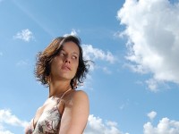 Female Student Under Blue Sky